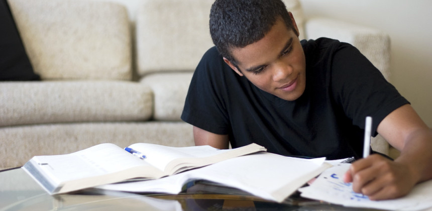 Adult learner studying at home while balancing work and family responsibilities